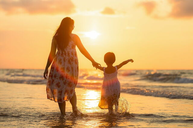 Mother and child on a beach