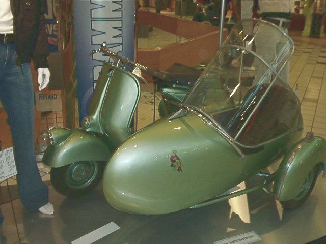 old style vespa with sidecar