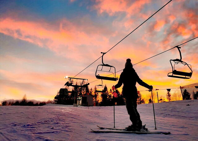 Skiing at sunset