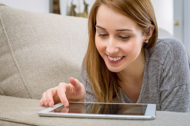 A woman on a tablet