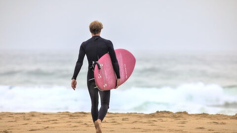 Man going surfing