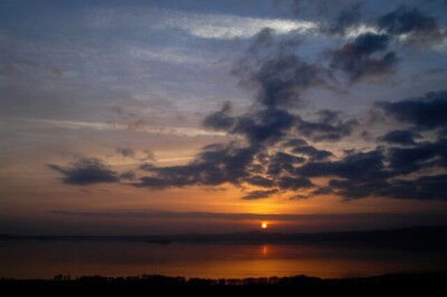 sunset over lake bolsena