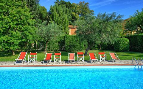 Villa Fiamma: Water, Sky, Plant, Nature, Cloud, Tree, Natural Landscape, Swimming Pool, Leisure, Grass