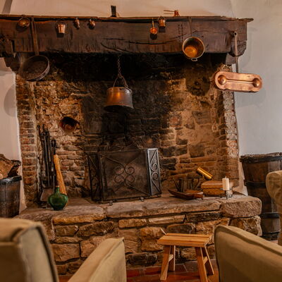 Casa Di Vignolo: Furniture, Wood, Interior Design, Lighting, Living Room, Room, Chair, Hearth, Hardwood, Natural Material