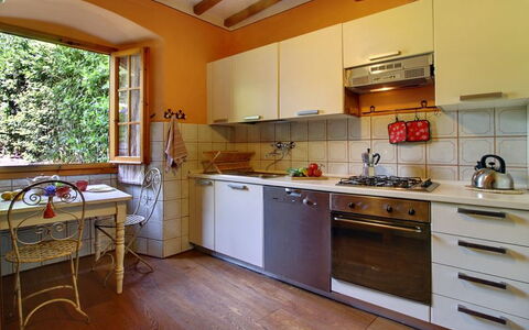 Villa Acacia: Countertop, Room, Kitchen, Property, Cabinetry, Furniture, Building, House, Wood Flooring, Floor