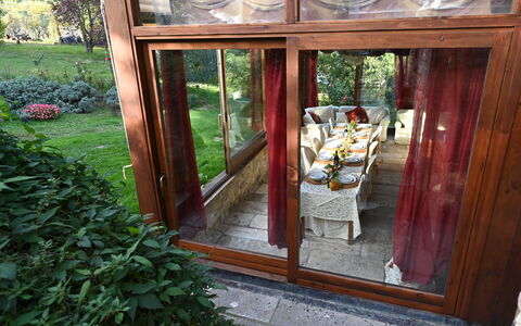 Villa Ardene: Plant, Wood, Door, Interior Design, Wood Stain, Building, Hardwood, Shade, Tree, Porch