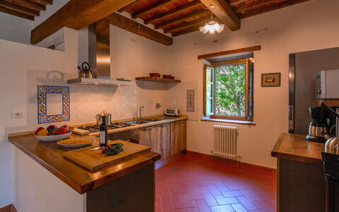 Villa Il Prato: Wood, Kitchen, Interior Design, Flooring, Countertop, Kitchen Appliance, Home, Ceiling, Furniture, Room