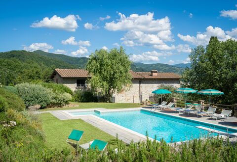 Podere Schignano: Plant, Cloud, Water, Sky, Furniture, Building, Swimming Pool, Green, Tree, Architecture