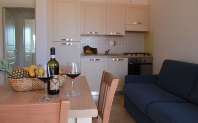 Bilocale Piano Terra 322: Room, Property, Furniture, Interior Design, Building, Living Room, House, Floor, Real Estate, Table