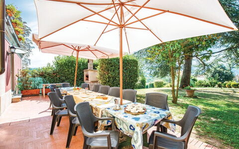 Villa i Cedri: Plant, Table, Furniture, Property, Chair, Sky, Shade, Tree, Outdoor Table, Outdoor Furniture