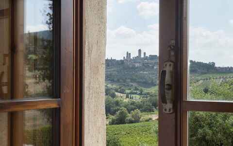 Agriturismo Paterno: Window, House, Sky, Room, Glass, Wood, Tree, Door, Architecture, Real Estate