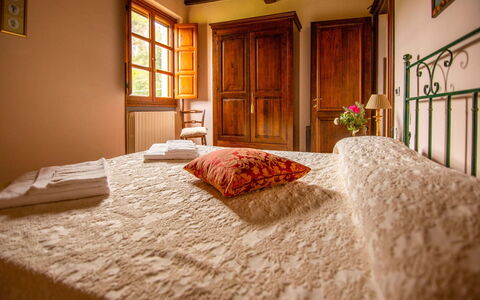 Collina dei Fiori: Wall, Interior Design, Bedroom, Furniture, Wood, Bed, Bed Sheet, Flooring, Floor, Bedding