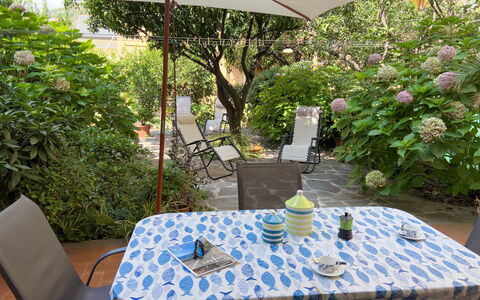 Casa Mary - Levanto: Furniture, Umbrella, Chair, Outdoor Furniture, Table, Outdoor Table, Kitchen & Dining Room Table, Shade, Garden