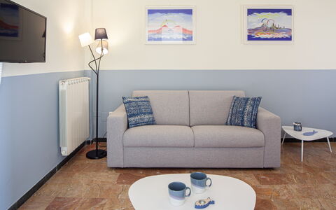 Giulia Apartment - Levanto: Furniture, Property, Table, Tableware, Product, Azure, Couch, Picture Frame, Lighting, Wood