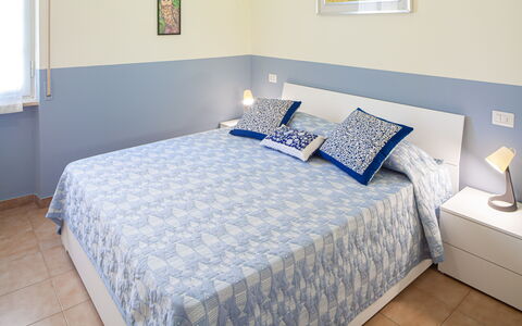 Giulia Apartment - Levanto: Building, Furniture, Property, Comfort, Azure, Window, Blue, Wood, Textile, Interior Design