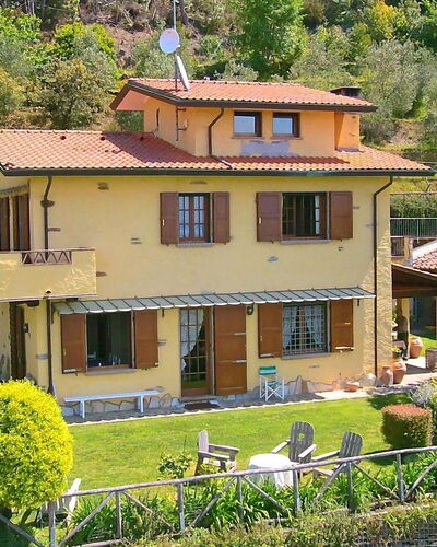 Villa La Collinetta: Plant, Window, Property, Building, Green, Tree, House, Yellow, Vegetation, Cottage