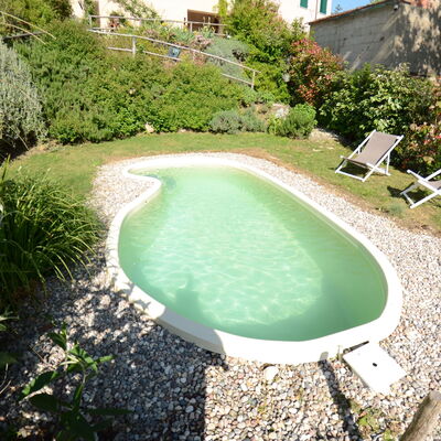 Al Colle Di Lari: Swimming Pool, Property, Natural Landscape, Grass, Water, House, Real Estate, Leisure, Estate, Landscape