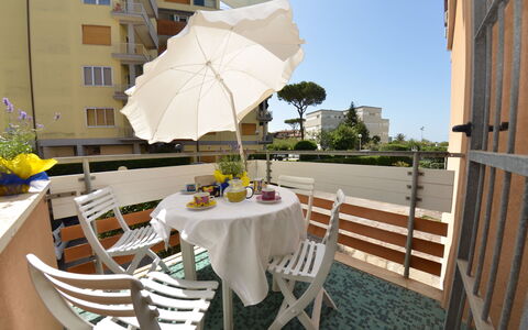 Carnevale: Property, Table, Furniture, Balcony, Yellow, Room, Restaurant, Apartment, Real Estate, Building