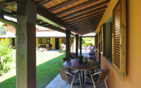 Villa le Balze: Wood, Porch, Furniture, Shade, Home, Door, Outdoor Structure, Backyard, Wood Stain, Flowerpot