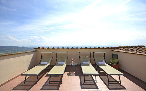 Terrazza Cortonese: Sky, Architecture, Building, House, Roof, Horizon, Sea, Furniture