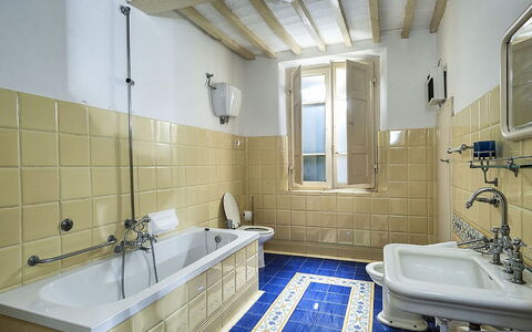 Villa Montalcinello In Siena, Private Pool: Mirror, Tap, Plumbing Fixture, Bathtub, Property, Sink, Bathroom, Window, Bathroom Sink, Purple
