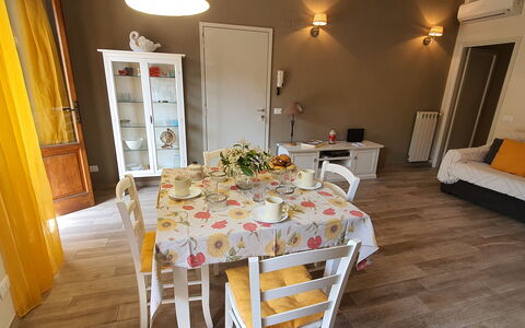 Musetta: Table, Furniture, Food, Wood, Chair, Couch, Lighting, Orange, Interior Design, Decoration