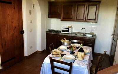 Il Chiantico 32: Room, Furniture, Property, Floor, Building, Interior Design, Hardwood, Kitchen, Cabinetry, Dining Room