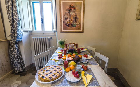 Michelangelo Cortona Apartment: Room, Property, Yellow, Interior Design, House, Brunch, Breakfast, Furniture, Meal, Table
