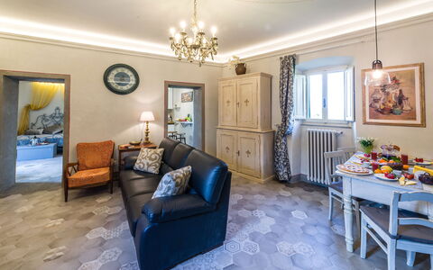 Michelangelo Cortona Apartment: Room, Property, Living Room, Furniture, Interior Design, Real Estate, Building, Blue, Yellow, Home