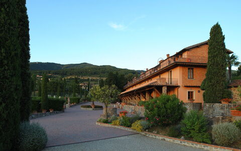 Fattoria Fronzano: Plant, Sky, Building, Property, Window, Tree, Road Surface, Mountain, Land Lot, House