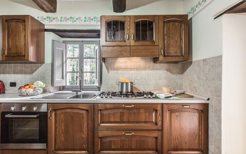 Torre del Cielo: Cabinetry, Countertop, Furniture, Room, Kitchen, Property, Interior Design, Building, Wood Stain, House