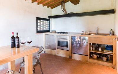 Vinsantaia-San Giovese: Furniture, Property, Cabinetry, Countertop, Kitchen Appliance, Kitchen Stove, Wood, Bottle, Kitchen, Home Appliance