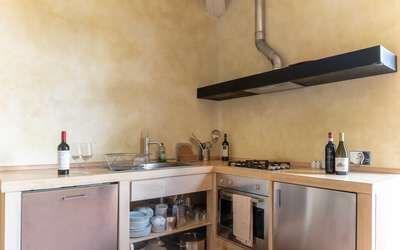 Moraiolo: Countertop, Wood, Bottle, Kitchen, Kitchen Appliance, Floor, Home Appliance, Wood Stain, Hardwood, Flooring