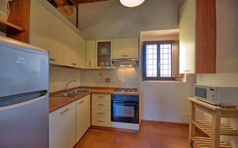 Pozzo Dei Desideri: Countertop, Room, Cabinetry, Kitchen, Property, Furniture, Building, Kitchen Stove, Floor, Hardwood