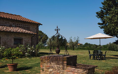 Pozzo Dei Desideri: Plant, Sky, Property, Window, Building, Land Lot, Tree, Grass, Shade, Landscape