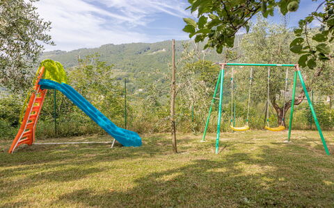 Villa Dell'angelo: Playground, Swing, Outdoor Play Equipment, Public Space, Playground Slide, Green, Human Settlement, Tree, Chute, Play