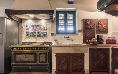 Villa Dell'angelo: Countertop, Cabinetry, Furniture, Room, Kitchen, Property, Interior Design, Tile, Building, Kitchen Stove
