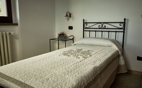 Villa Umbra: Bedroom, Bed, Furniture, Bed Sheet, Room, Bedding, Property, Mattress, Bed Frame, Floor