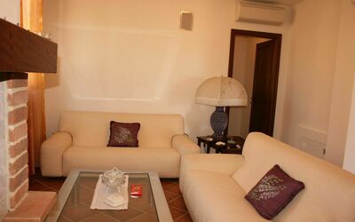 Emerald: Room, Property, Furniture, Living Room, Interior Design, Building, House, Real Estate, Suite, Table