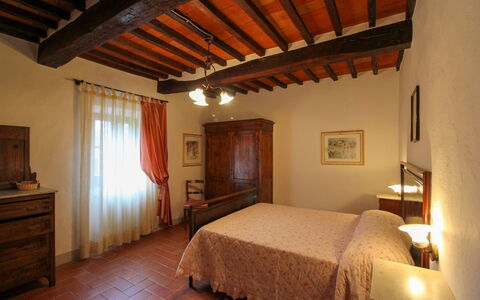 Borgo di Usciano: Furniture, Wall, Interior Design, Bedroom, Wood, Bed, Flooring, Ceiling, Floor, Room