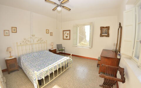 Collina Lagomare: Property, Room, Furniture, Bedroom, Bed, Building, Ceiling, Interior Design, House, Ceiling Fan