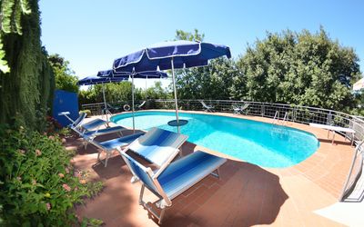 Il Corbezzolo: Swimming Pool, Property, Real Estate, Resort, Leisure, Vacation, Water Park, Shade, Building, Outdoor Furniture