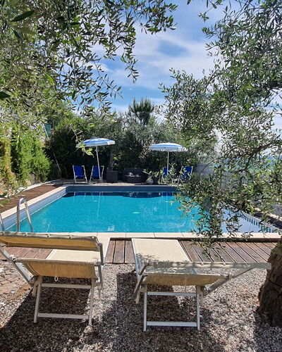 Podere San Martino: Water, Swimming Pool, Cloud, Sky, Shade, Tree, Plant, Natural Landscape, Leisure, Landscape
