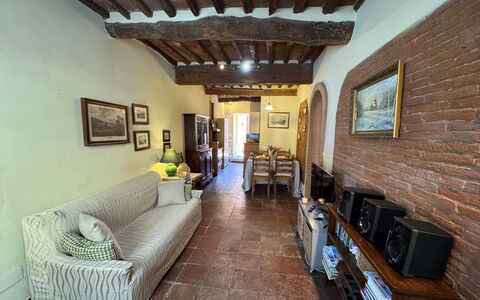 Casina Bella Di Lucca: Furniture, Wall, Interior Design, Flooring, Couch, Wood, Floor, Ceiling, Room, Living Room