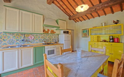 Terrazza: Cabinetry, Furniture, Property, Kitchen, Wood, Interior Design, Table, Architecture, Wood Stain, Flooring