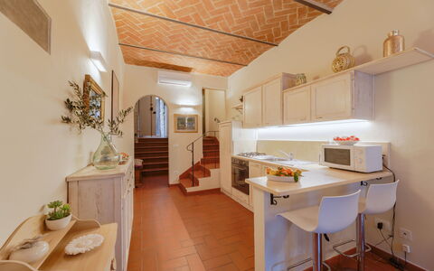 Marlene House: Furniture, Table, Cabinetry, Plant, Countertop, Sink, Kitchen, Wood, Interior Design, Flowerpot