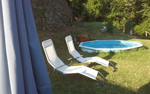 Emilia: Plant, Water, Outdoor Furniture, Shade, Swimming Pool, Grass, Leisure, Tree, Rectangle, Landscape