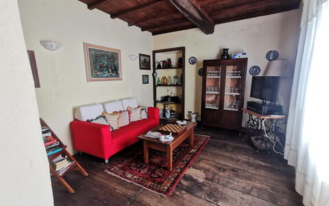 Emilia: Picture Frame, Furniture, Table, Couch, Building, Wood, Interior Design, Floor, Living Room, Flooring