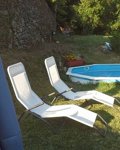 Emilia: Plant, Water, Outdoor Furniture, Shade, Swimming Pool, Grass, Leisure, Tree, Rectangle, Landscape