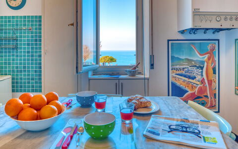 Apartment Mare Bello - Levanto: Blue, Room, Turquoise, Property, Orange, Aqua, Azure, Interior Design, Table, House